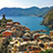 We followed the path to Corniglia, stopped to catch our breathe and looked back at Vernazza below.