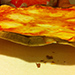 Thin and light like a cracker.  The best pizza we had in Italy.