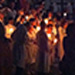  Candlelight everywhere.  The steps of the church got crowded while folks waited their turn to join the procession.